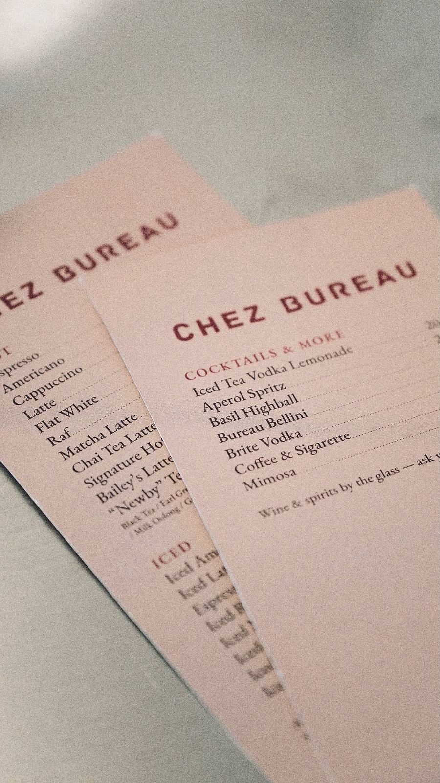 The two printed Chez Bureau menu cards — coffee, tea and cocktails