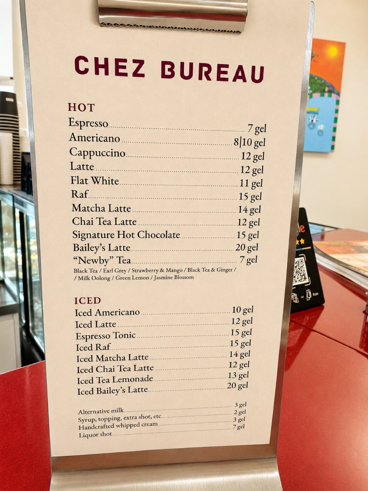 The printed Chez Bureau menu on the counter