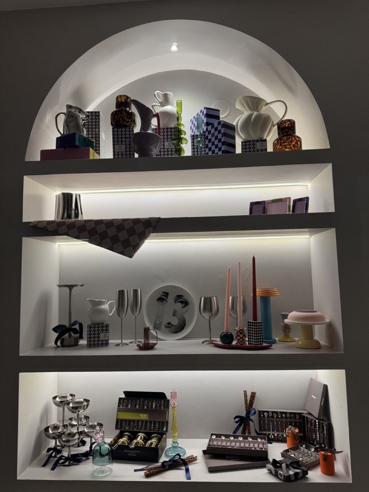 Curated shelves of wine and glassware